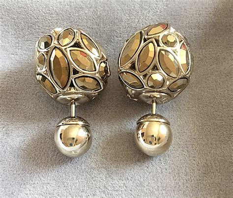 mise en Dior tribal earrings